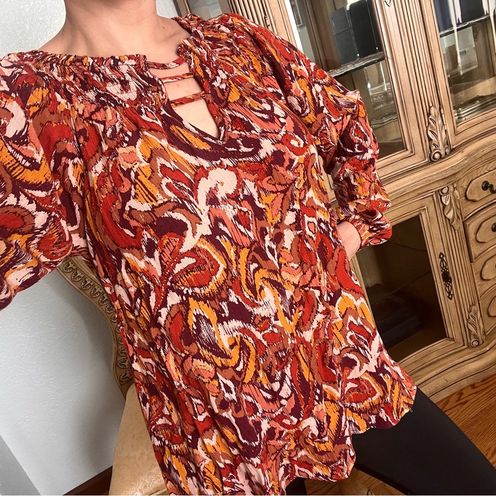 Dress blouse patterned from buckle
